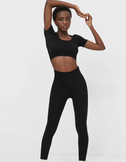 Stradivarius – Nahtlose Leggings mit Rippenstruktur in Schwarz