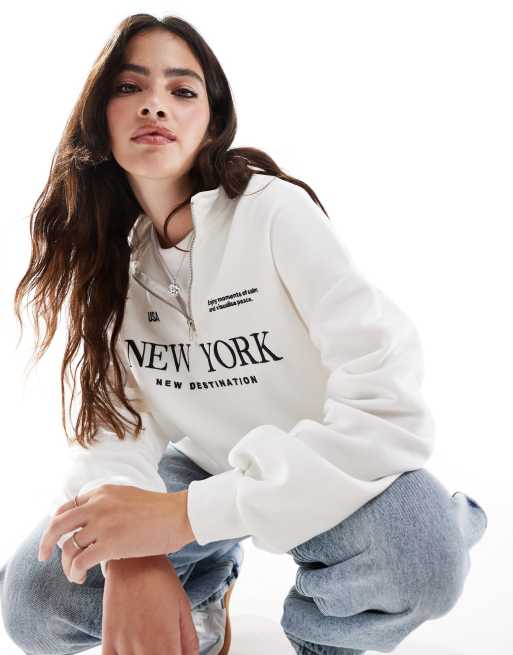 Stradivarius New York slogan quarter zip sweatshirt in ecru