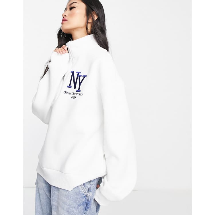 Stradivarius NY 1/4 zip sweatshirt in ecru | ASOS