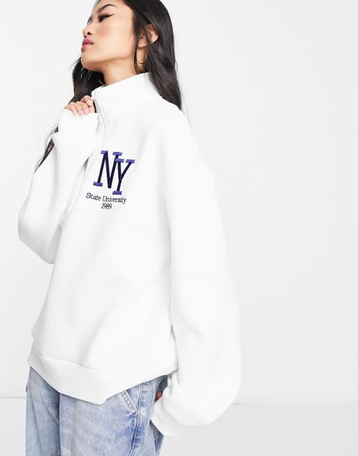 Stradivarius NY 1/4 zip sweatshirt in ecru