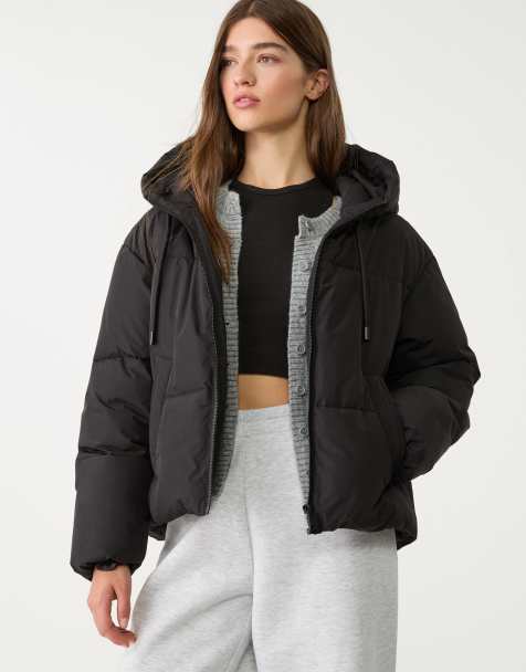 Stradivarius – Oversize-Steppjacke in Schwarz mit Kapuze - view 1