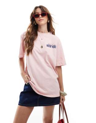 Stradivarius - Oversize-T-Shirt in Blassrosa mit „New York"-Print