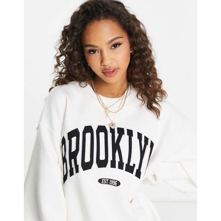 Stradivarius oversized Brooklyn sweatshirt in white