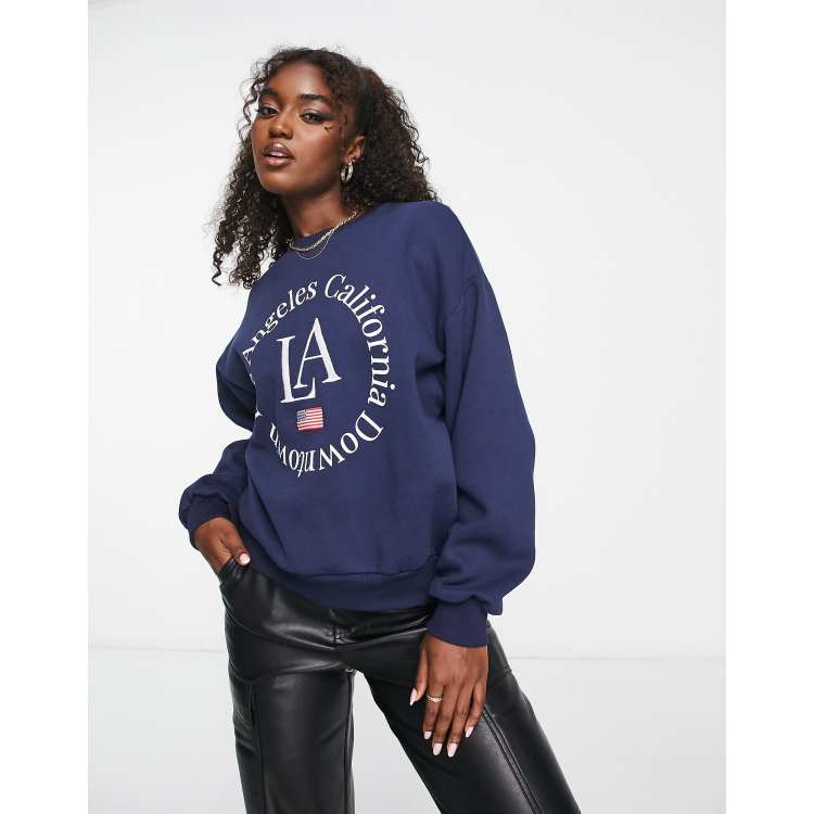 Stradivarius Boston slouchy sweatshirt in wine