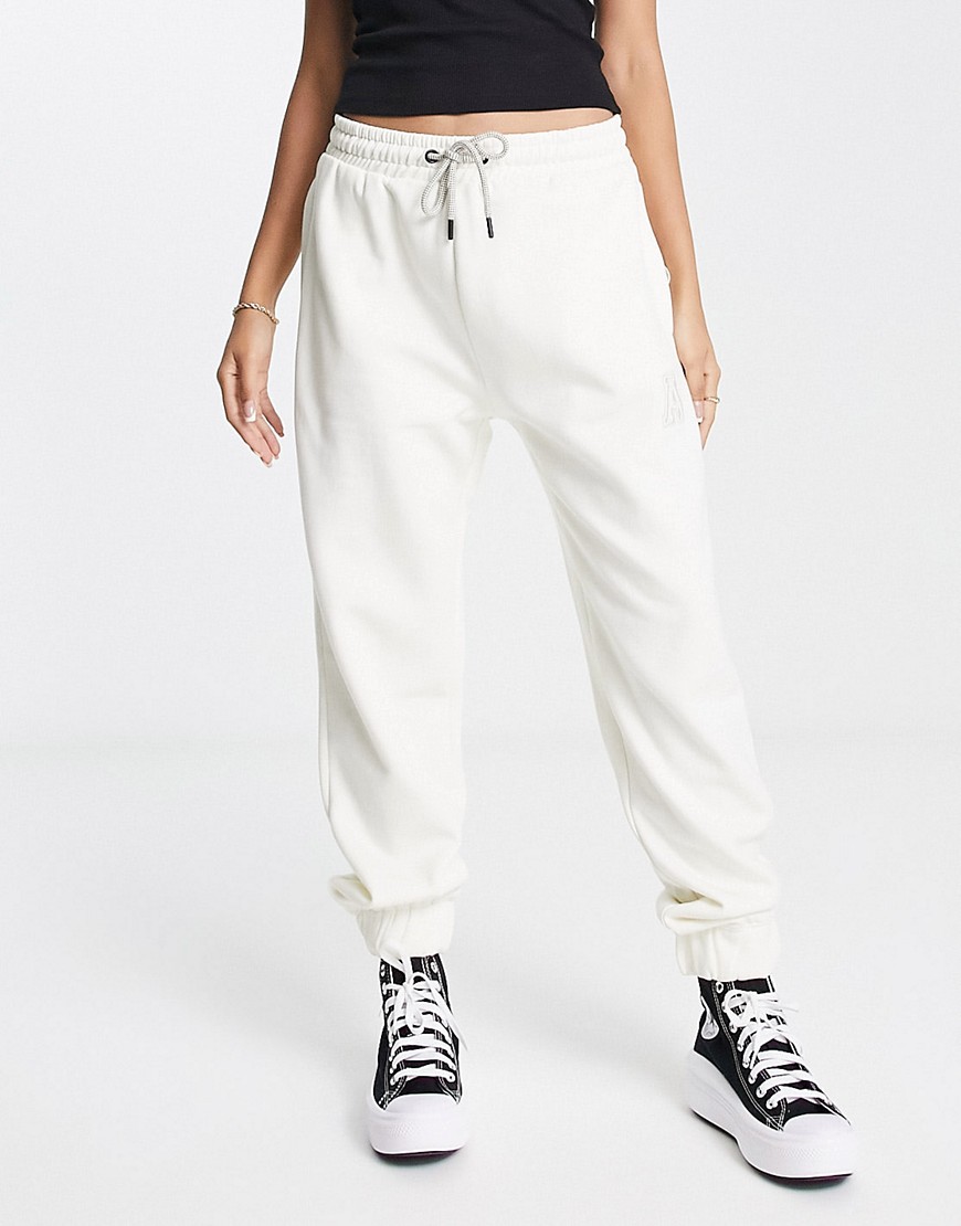 Stradivarius oversized sweatpants with A embroidery in ecru - part of a set-White