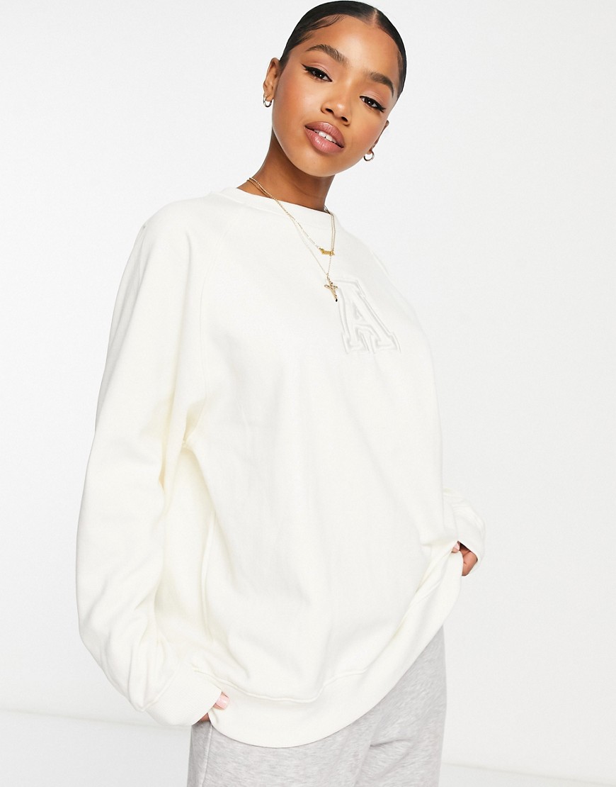 Stradivarius oversized sweatshirt with A embroidery in ecru-White