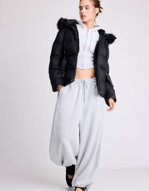 Stradivarius Padded jacket with belt and hood in black - view 1