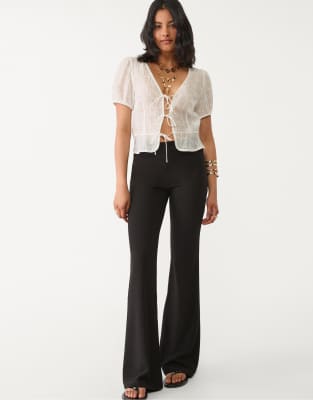 Stradivarius - Pantalon évasé en maille unie - Noir