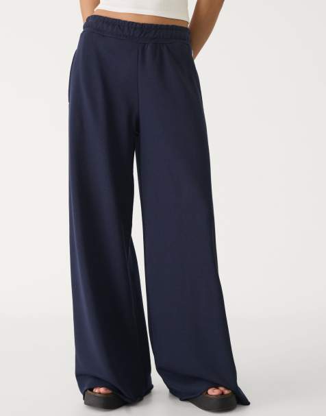Stradivarius - Pantaloni a fondo ampio color blu navy con finiture - view 1