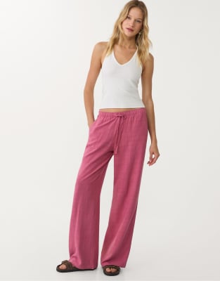 Stradivarius - Pantaloni rosa chiaro in misto lino