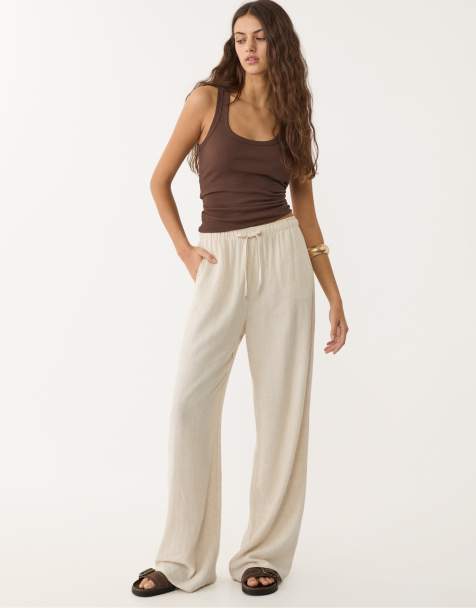 Stradivarius Petite – Beige, böljande byxor i linnemix - view 1
