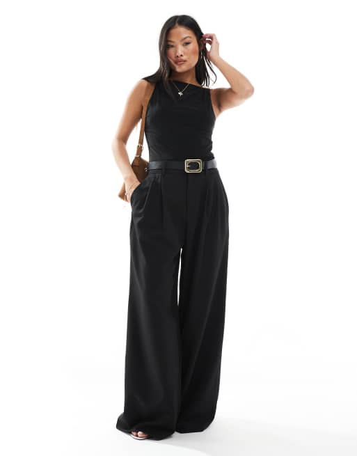 Stradivarius Petite - Broek met plooien en wijde pijpen in zwart