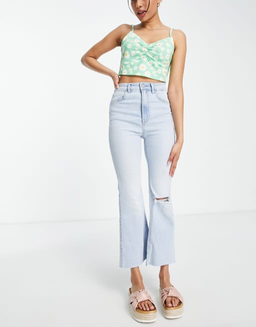 Stradivarius Petite crop flare jeans in medium blue