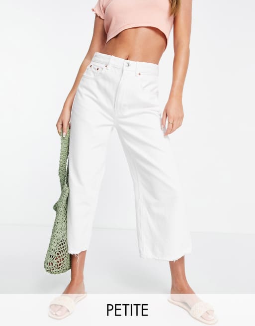 Stradivarius Petite cropped denim jeans with raw hem in white 