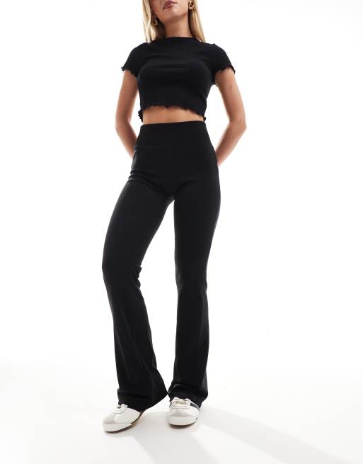 Stradivarius Petite deep waistband sculpt flare in black ASOS