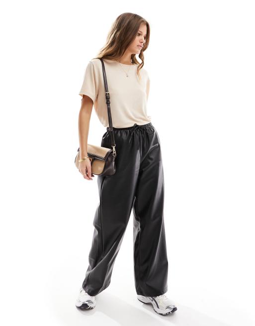 Stradivarius Petite faux leather wide leg jogger in black