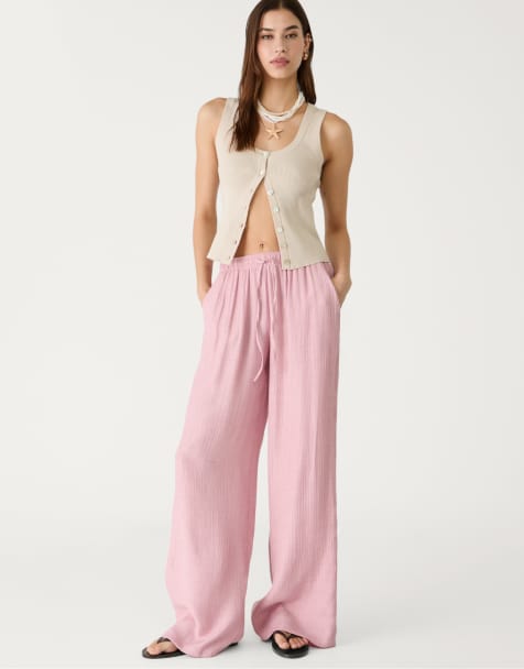 Stradivarius Petite flowing textured trousers in pastel pink