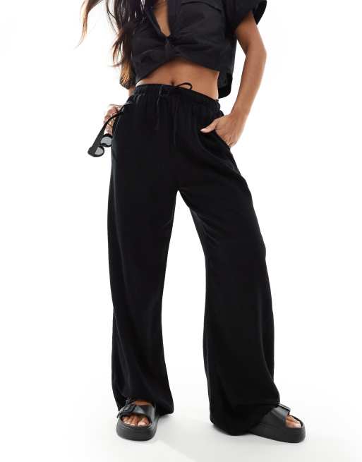 Stradivarius Petite linen look pull on trouser in black