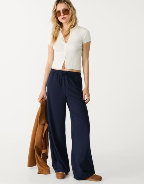 Stradivarius Petite long flowing smart trousers in dark blue