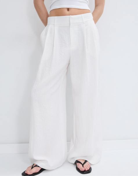 Stradivarius Petite - Pantaloni a fondo ampio stile rustico écru con bottoni regolabili - view 1