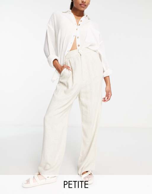 Stradivarius Petite - Pantaloni dad a fondo ampio in lino colore neutro 