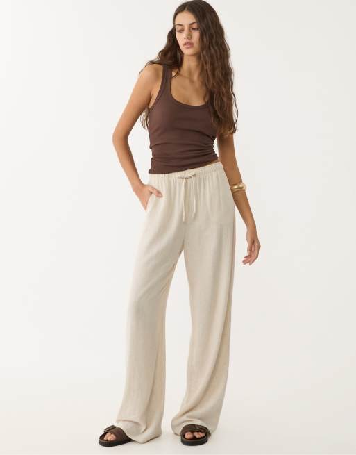 Stradivarius Petite - Pantaloni morbidi in misto lino color pietra