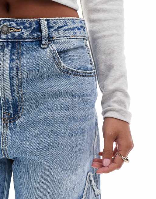 Stradivarius Petite - STR - Jeans met wijde pijpen en stervormige patch in middenblauw, 2 van 5