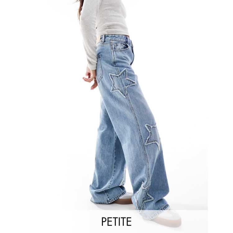 Stradivarius Petite STR wide leg jean with star patch in medium blue ASOS