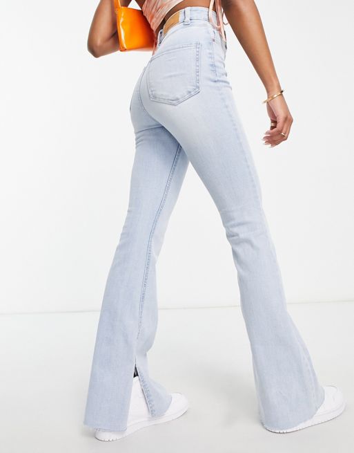 Stradivarius Tall stretch flare jeans with split detail in light blue -  ShopStyle