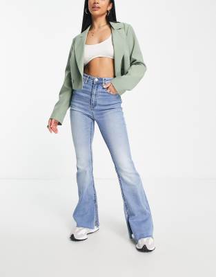 stradivarius stretch flare jean with split detail in light blue