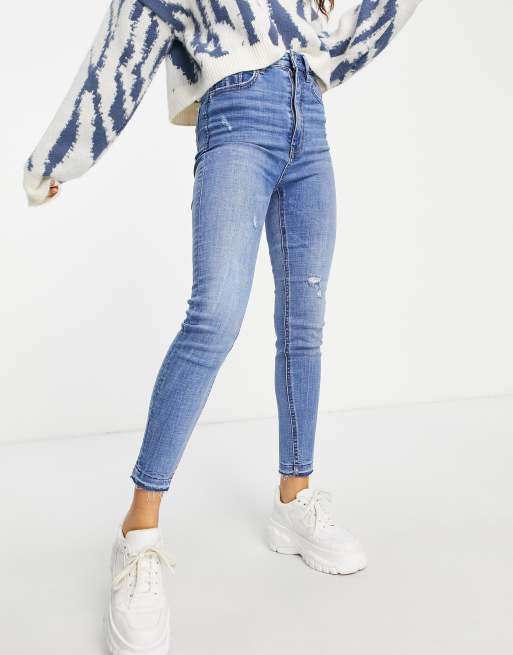 Stradivarius Petite super high waist skinny jeans in light blue