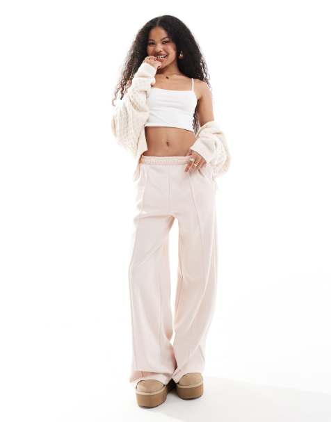 Stradivarius Petite – Weiche Jogginghose in Hellrosa mit weitem Bein und Ziernaht vorne - view 1