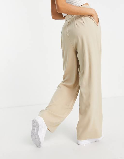 Stradivarius Petite wide leg relaxed dad trousers in beige ASOS