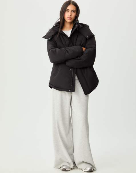 Stradivarius - Piumino oversize nero con cappuccio - view 1