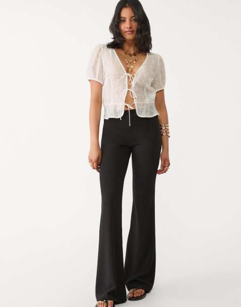 Stradivarius plain knit flared trousers in black