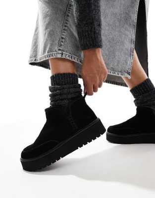 platform fluffy boots in black