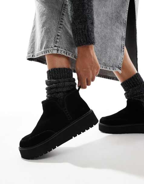 Stradivarius platform fluffy boots in black - view 1