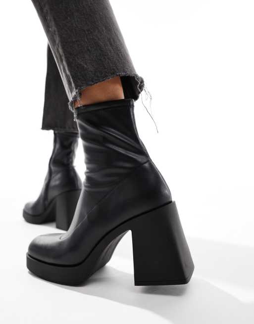 Black and white heel boots best sale