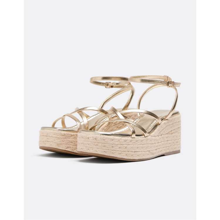 Stradivarius Platform strap wedges in gold | ASOS