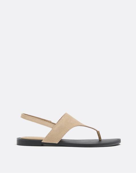 Stradivarius - Platte instapsandalen met detail in beige - view 1