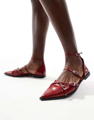 pointed ballet shoe with buckles in red