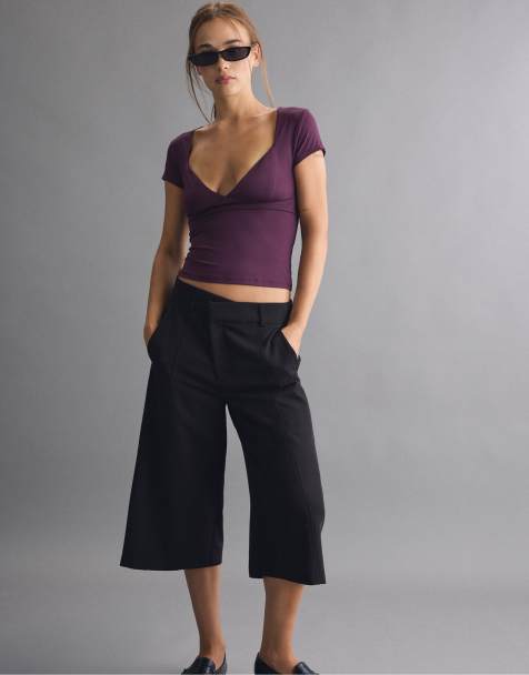 Stradivarius polyamid T-shirt med v-hals i lilla - view 1