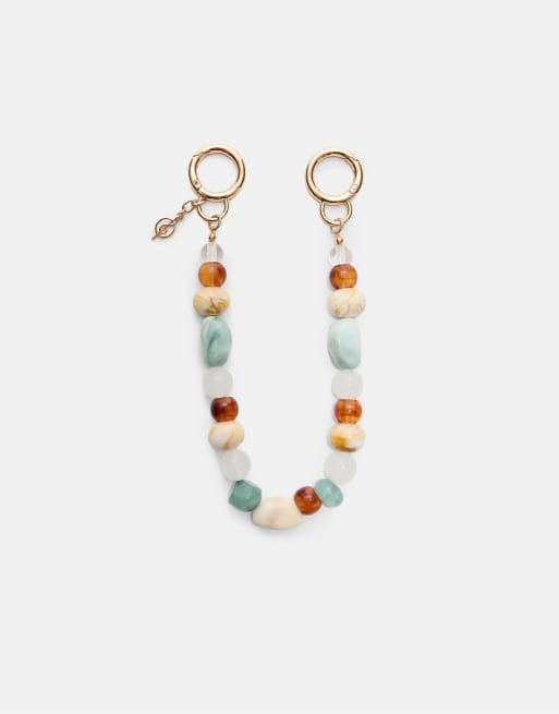 Stradivarius - Portachiavi color oro con charm con perline