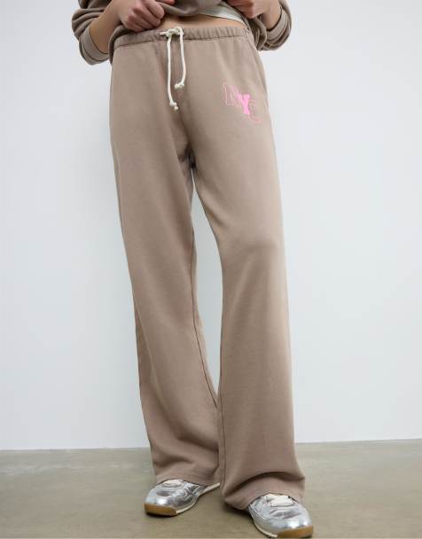 Stradivarius Positional washed effect jogger trousers in beige - view 1