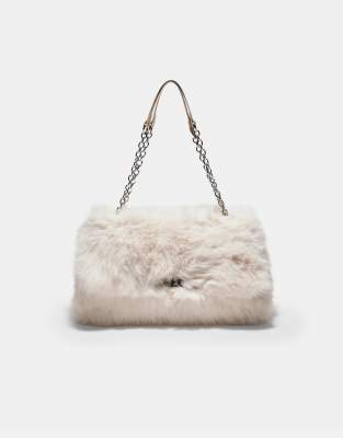 Stradivarius Rectangular faux fur crossbody bag in ecru | ASOS