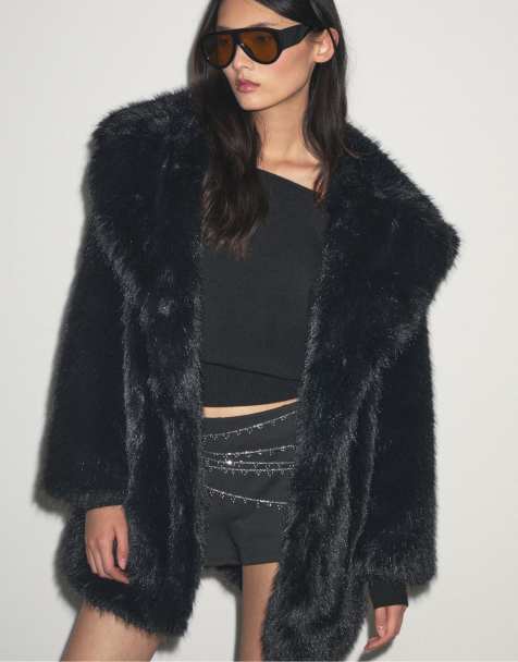Stradivarius Regular fit faux fur coat in black - view 1