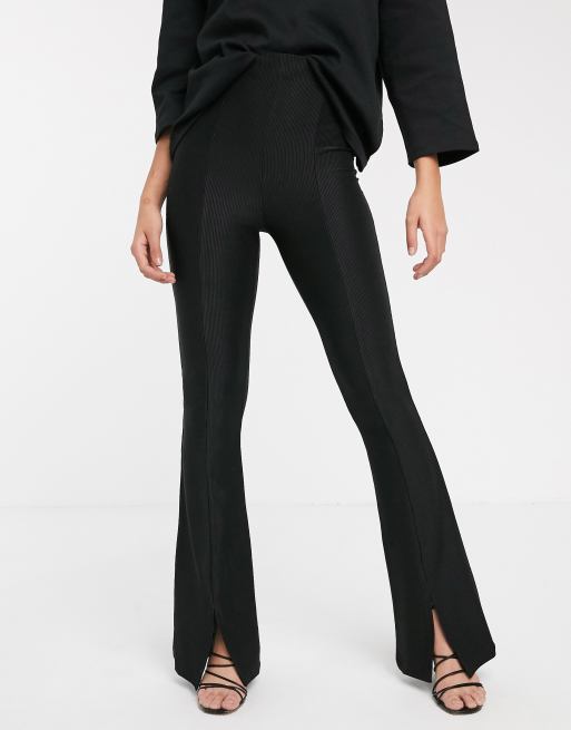 Stradivarius ribbed jersey flare trousers with slit in black