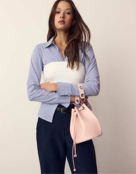 Stradivarius Rigid eyelet bucket bag in pastel pink - view 1