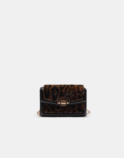 Stradivarius Rigid faux fur crossbody bag in brown - view 1