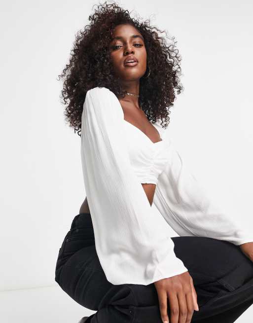 Stradivarius ruched front top with flared sleeve in white | ASOS